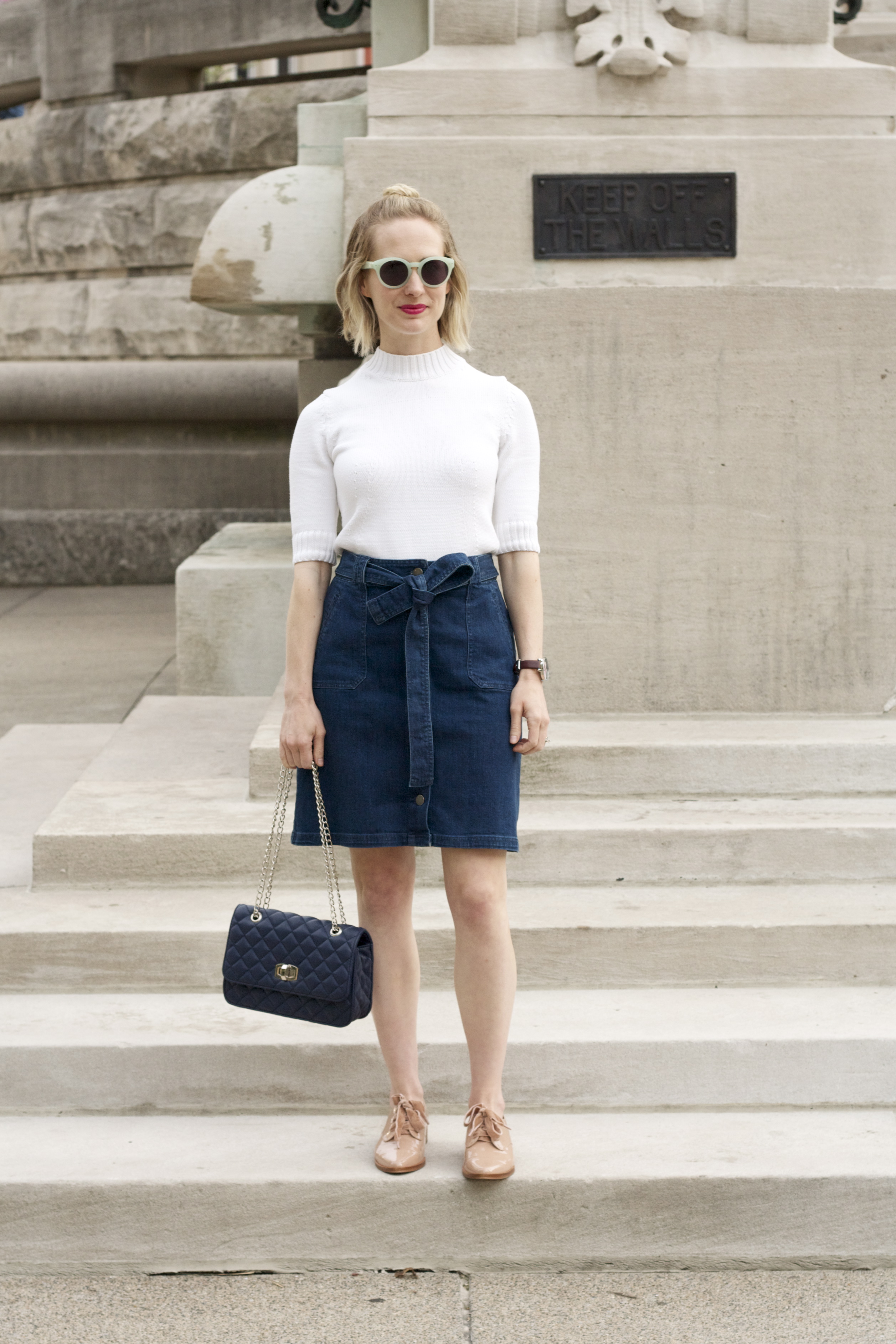 jean skirt, turtleneck, navy quilted bag, blush oxfords