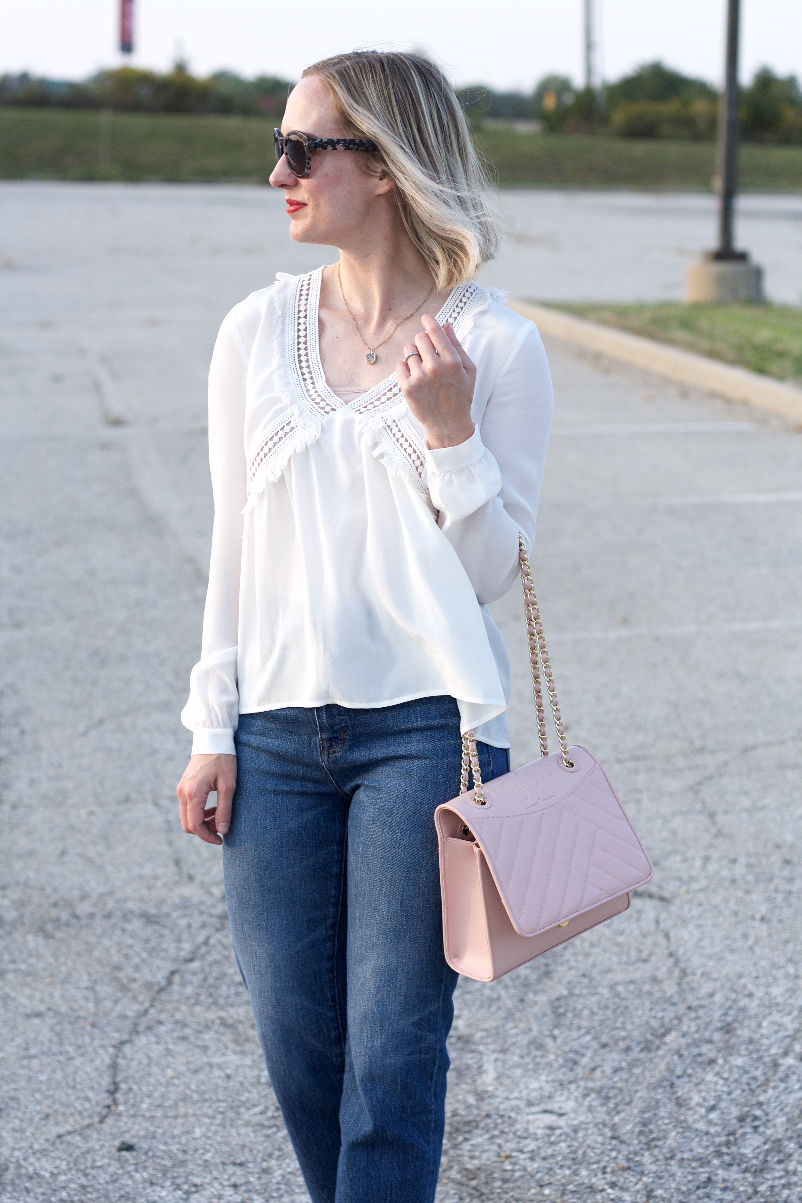 Sezane silk top, Madewell cropped jeans, Tory Burch chain strap bag